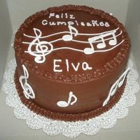 Music Notes Cake Chocolate cake wih chocolate buttercream. Music notes are royal icing.