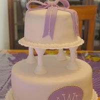 Birthday Cake mmf fondant over white cake with rasberry filling. I made this cake for my daughters 2nd bithday.