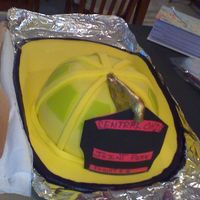 Fire Helmet French vanilla cake with b/c under fondant made for the local fire departments christmas party
