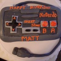 Nintendo Controller Cake I made this cake for my husband's 28th birthday. It wasn't perfect but he loved it. Not my best work though.