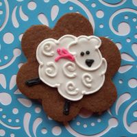 Lamb Prancing Aboutq Chocolate Sugar cookie w/RI. Lamb inspired by TracyLH. Not quite up to her level, but I feel like I'm making some progress!