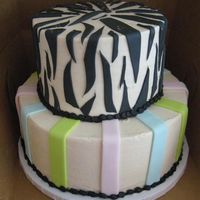 Funky B*day Cake 9" and 6" iced in BC with fondant accents