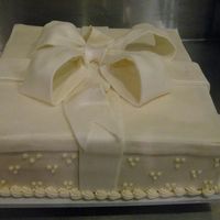 Ivory Gift square cake covered with fondant