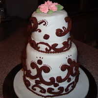 Blue And Brown My attempt at practicing piping on my own birthday cake. Piping with regular ganache was not so successful. Lesson learned.