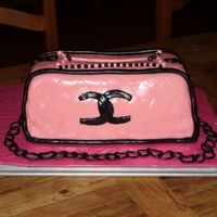 Chanel Purse Cake This was my first purse cake and I was a little disappointed that cake was a little saggy. I pulled fondant off once and started completely...