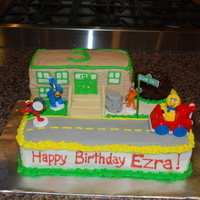 123 Sesame Street Chocolate cake on bottom. Yellow cake for building. All BC. Nest is made from Chocolate covered chow mein noodles, Steps are Sugar Wafers....