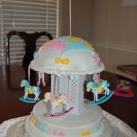 Carousel Cake My sister and I made this cake for her baby's 1st bday. The dome part of the carousel was her smash cake. There's a flag at the...