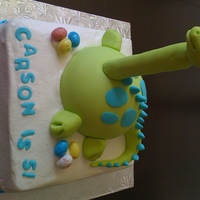 Dinosaur Loosely based on Debbie Brown's Dippy Dinosaur from her 50 Easy Party Cakes book. Dino body was made from Wilton sports ball pan, neck...