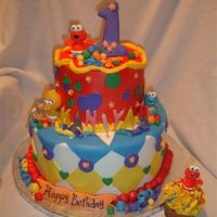 Baby Sesame Baby Sesame themed cake. Butter cream and fondant accents