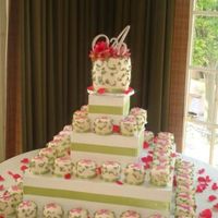 Acobacey Wedding 50 mini cakes-each covered in fondant and piped with RI. These little mini cakes are sooooo much work...but when you see them all done and...