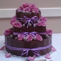 Choc. Bar Wedding Cake This cake decorated with hershey choc. bars.