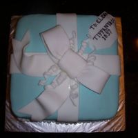 Tiffany Box Cake Tiffany box cake. Fondant covered cake with fondant ribbon.