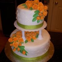 Orange Rose Cake Tiered cake with 50/50 fondant/gumpaste roses. My first tiered cake