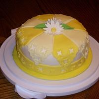 Daisy Cake From the Wilton Gumpaste course. My instructor picked this cake. I'm not in love with the design, but I guess it turned out alright.