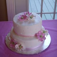 Bridal Shower Cake Made this for a sorority sister's bridal shower. WASC with almond buttercream and covered in fondant. Gumpaste flowers are anemones.