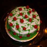 Raspberry Vine Fresh raspberries dipped in red decorator sugar. The cake was devil's food with homemade raspberry filling. Yummy!