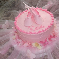 Ballerina Birthday Ballet slippers are gumpaste. Tutu is made from tulle and silk flowers.