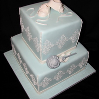 Baby Blue I made this for a baby shower. Gumpaste booties and rattle. TFL!