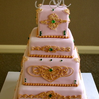 Pink And Gold Bride wanted a cake to go with her color scheme...pink, gold and emeralds. The piping on this cake took a really long time! I used a...