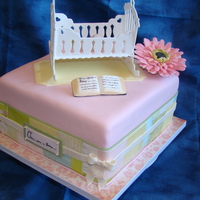 Amie's Storybook Cake 3 layer lemon w/raspberry buttercream filling. All decorations are gumpaste and border around cake is edible image. The daisy was from my...