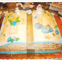 Confirmation Cake This is a chocolate cake filled with white chocolate mousse covered with butter cream. All decorations are made withfondant, white...