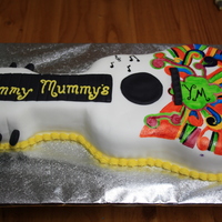 Guitar Chocolate cake covered with buttercream and fondant. Hand painted print was the same as the flyer for this mothers group open day..