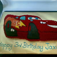 Lightning Mcqueen Buttercream covered chocolate cake.