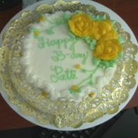 Birthday birthday cake with roses, rosettes, and rose buds