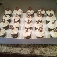 Music Notes Cupcakes wrapped in self-made cupcake wrappers (made from scrap paper). Buttercream frosting, gold sprinkles, and chocolate notes :)