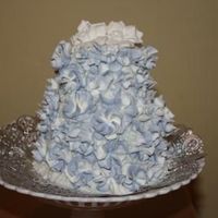 Flower Girl FLower girl mini wedding cake. carrot cake with white chocolate ganash poured over, royal icing flowers all around