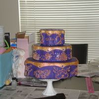 Henna Inspired Cake this cake was henna inspired, my own design tho, no templates just free handed it ((thats why each doesnt look identical)) not finished yet...