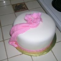 1St Time With Fondant This is a practice cake for my Wilton fondant and gumpaste class (lesson 2)It was hard working with the Wilton fondant b/c it became so dry...