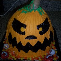 Pumpkin Cake Scary Lol this is a cake I did for a halloween themed birthday party on 10/10/2009 white cake with buttercream frosting tinted orange. wilton's...