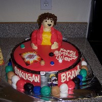 Bakugan Birthday Cake this was a chocolate and white layered cake with choc bc and reg buttercream frosting. homemade fondant which wasen't as sturdy as i...