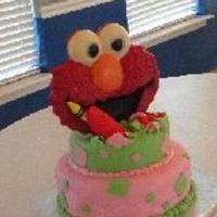 6 Yr Old Cake This is a cake that served 100 for a small school. The Elmo was red colored white chocolate plaque that I had made with dowels to hold it...