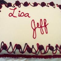 Lisa And Jeff's Wedding Shower Cake buttercream, white cake, wits raspberry filling