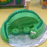 Dinosaur This was my first 3D cake. I borrowed the idea from a Publix bakery. I thought they were way overpriced on what they were asking for this...