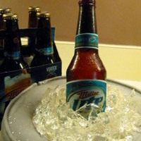 Sugar Beer Bottle And Ice Cake Poured sugar beer bottle and ice, Guinness chocolate cake, Guinness buttercream frosting.