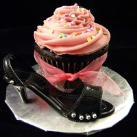 Birthday Cupcake And Shoe Jumbo sized chocolate cupcake with raspberry buttercream frosting. Gumpaste shoe.