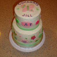 Coworker's Baby Shower I made this for a coworker's surprise shower to match the party decorations. This cake gave me nothing but trouble. It leaned, bulged...