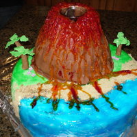Ty's Volcano Made for my nephew's birthday and it was a huge hit! Volcano was chocolate cake and base was vanilla. Covered in fondant, water and...