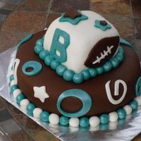 Baby Boy covered and decorated in MMF. Turquoise detailing painted with silver pearl dust. It was MEGA hot outside (100+ degrees), so everything...