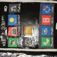 Iphone This was for my brother's birthday. Chocolate cake covered in chocolate ganache, which I added some black food coloring to make it...