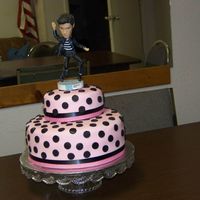 "elvis" Birthday Cake Pink fondant with black polka dots & an Elvis bobblehead topper