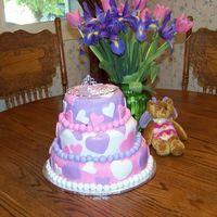 Princess Cake I made this cake for a friend's daughter's 1st birthday. Mom had requested a Princess cake for her. The top tier is frosted in...