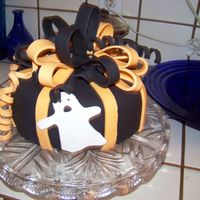 Boo! Black fondant covered. Fondant bow