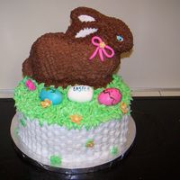 Easter Bunny In A Basket All buttercream with fondant decorations.