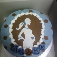 Little Boy Blue banana chocolate swirl ten inch with fudge icing filling with banana slices, buttercream with mmf decorations.