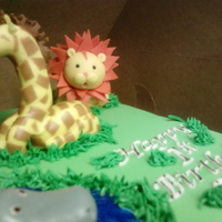 Jungle Fondant animals, fondant tie-dye marbled covered cake, this one was fun and they loved it.