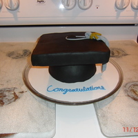 Graduation Cap And Tassel Client wanted a small center piece cake for a graduation party